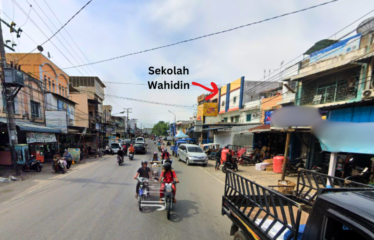 Ruko Jalan Titi Pahlawan depan sekolah Wahidin Sudirohusodo Marelan Simpang Kantor